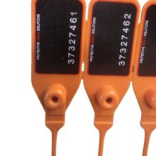 Plastic security seal close-up with unique sequential numbering